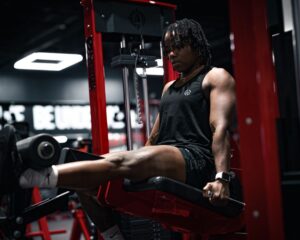 Andrew Jacked's 2026 Olympia Leg Workout: 5 Machine Exercises for Massive Quads & Glutes